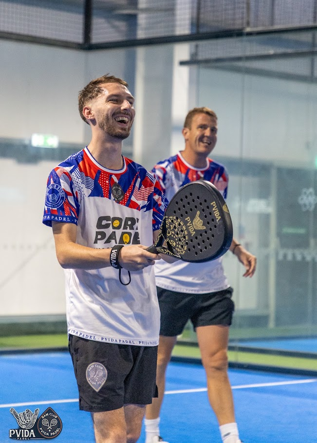 Mixed-ability players mid-rally during a MACA round